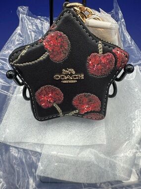COACH Black Star Coin Case with Red Sequin Cherry Accents